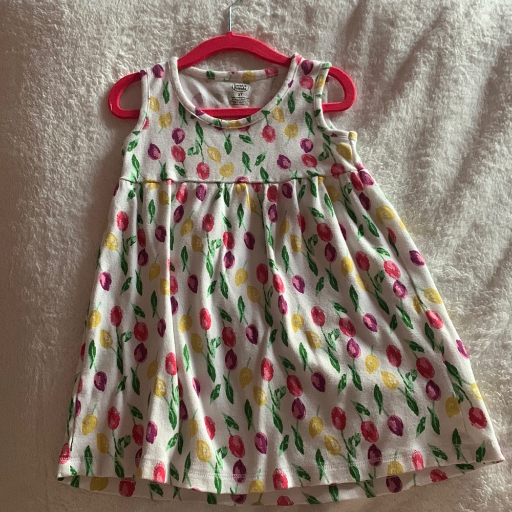 White cotton dress with purple, pink, and yellow tulips.